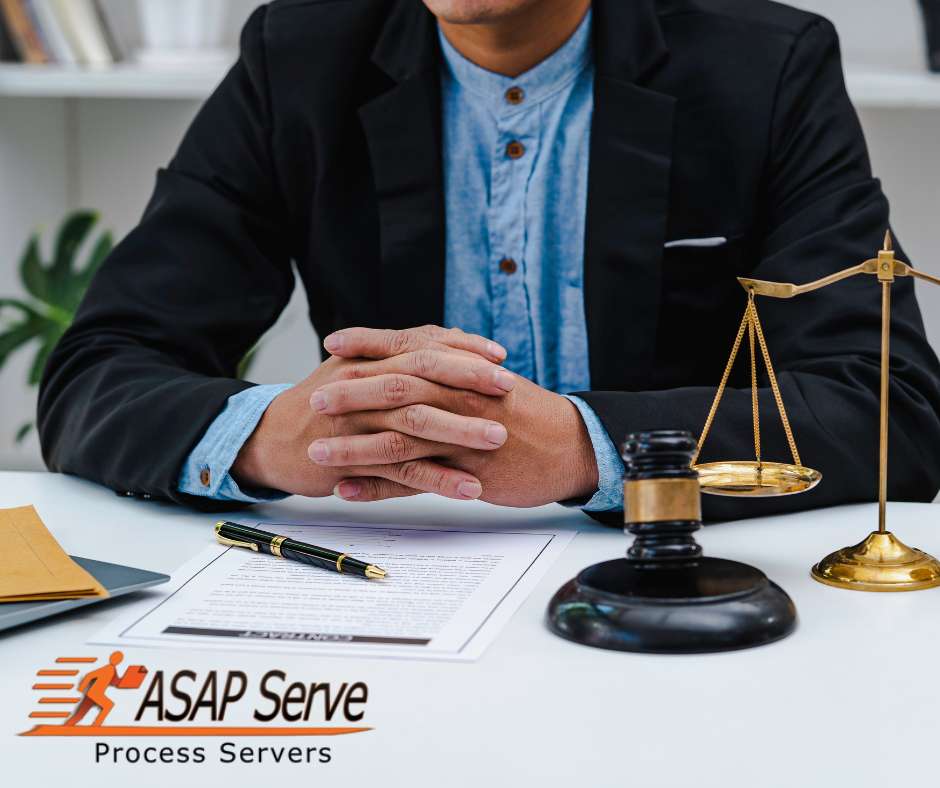 Process Servers at a desk with legal documents and scales